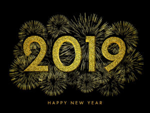 2019 Happy New Year. Gold Fireworks And Text On Dark Background